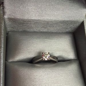 0.5 carat white gold diamond solitaire ring